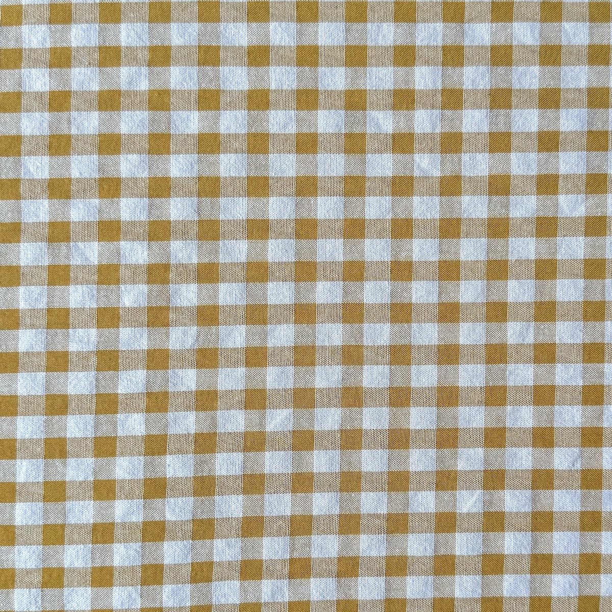 soft baby child blanket caramel gingham close-up