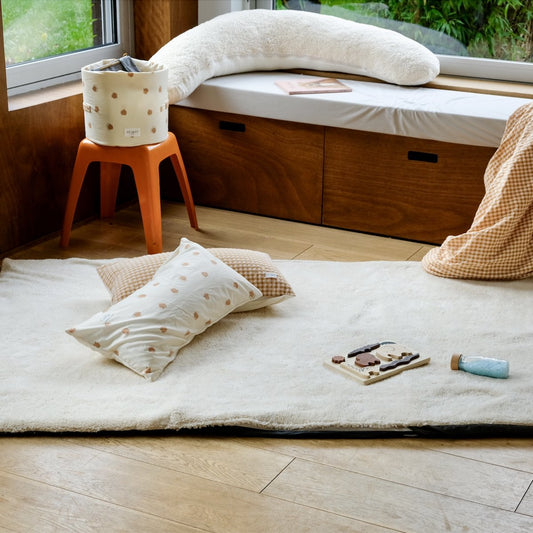 sheepskin-effect fluffy activity mat